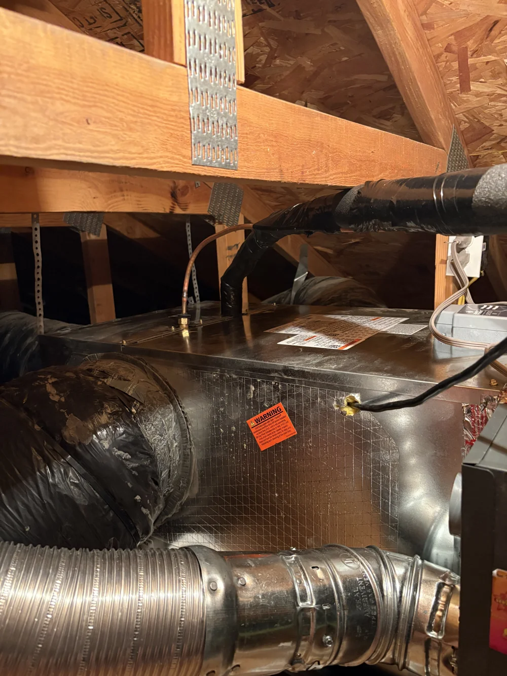 Indoor HVAC equipment with refrigerant lines and duct connections