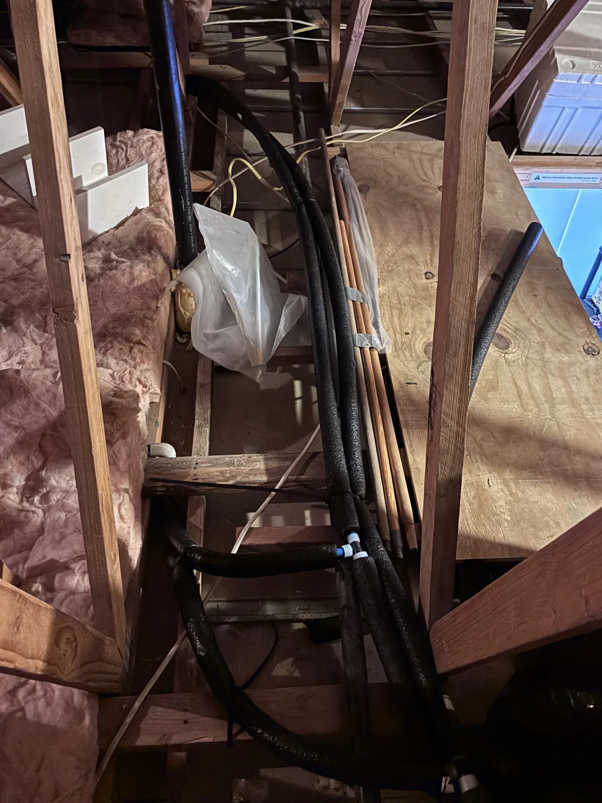 Insulated water lines routed through the attic