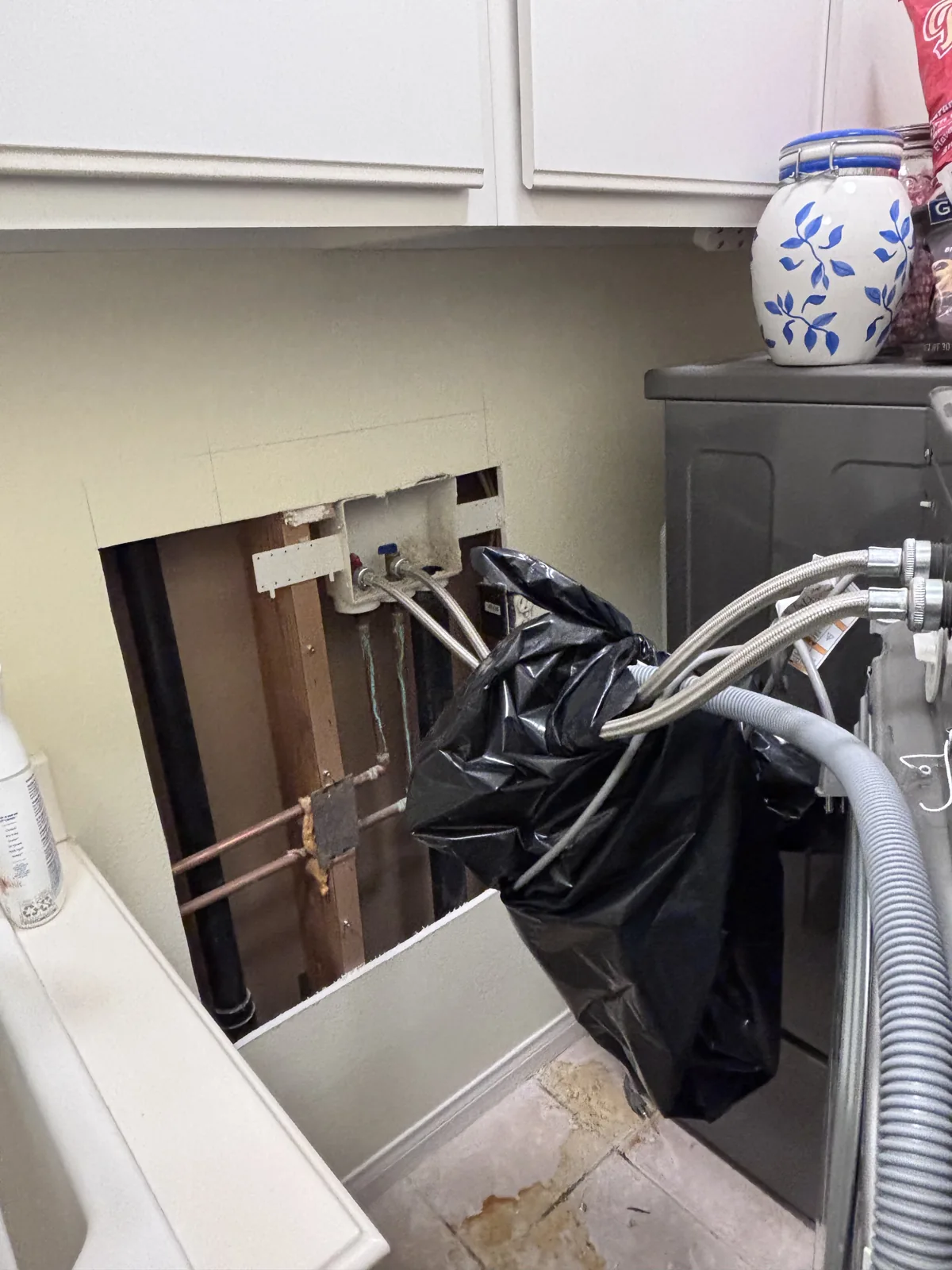 Laundry wall access and protective covering during the repipe